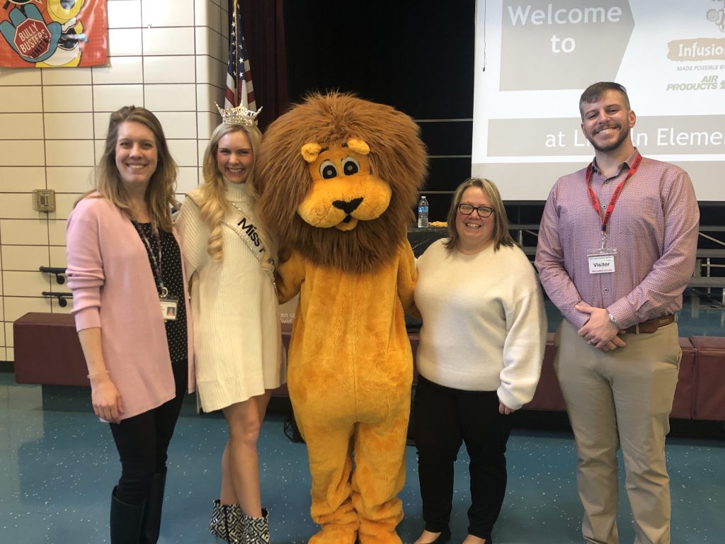 teachers and Lincoln Elementary Mascot smilling at the Infusion of Inclusion 2.0 program